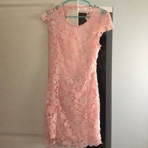 Light pink lace dress with low cut back